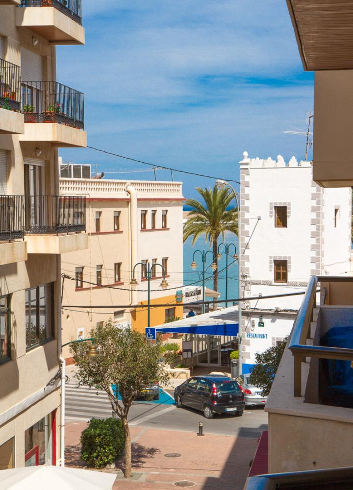 View from the balcony to the plaza and the sea.