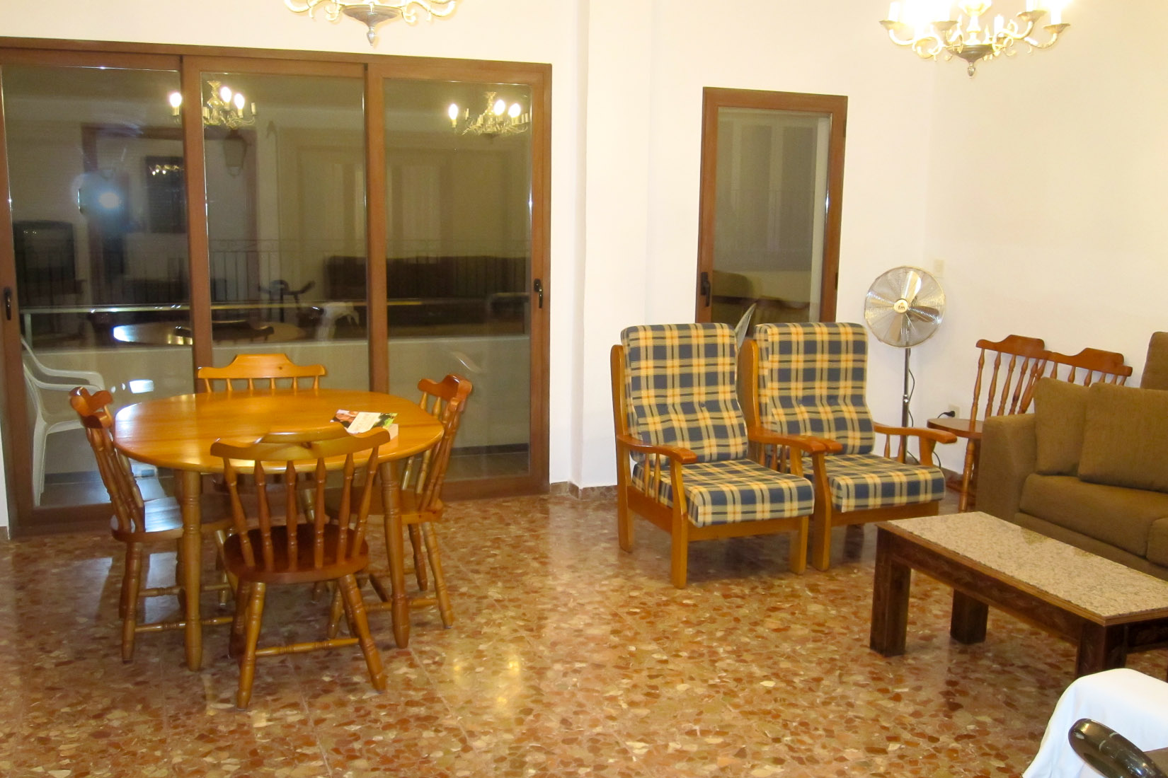 Spacious living area which opens out to generous balcony.