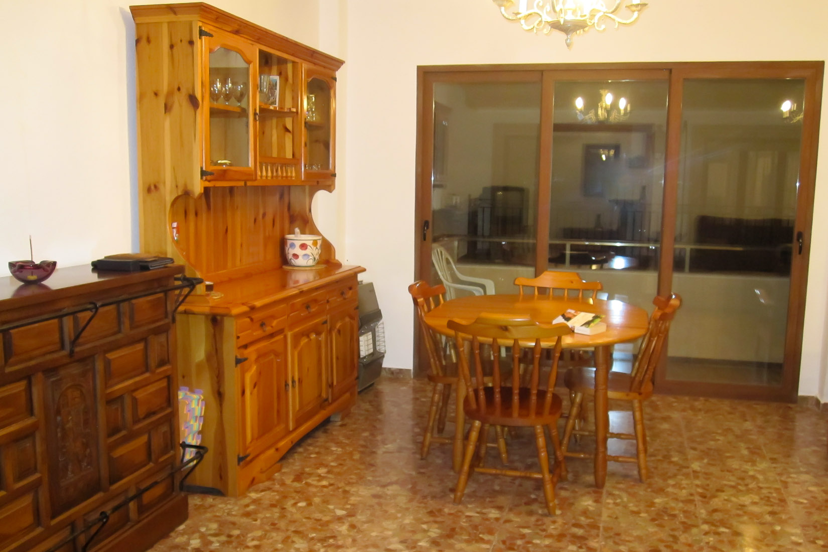 Spacious living area which opens out to generous balcony.